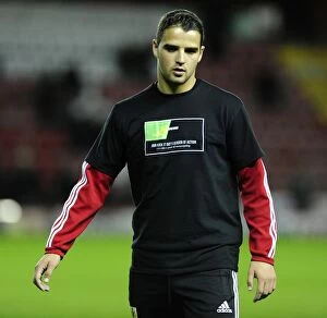 Images Dated 22nd October 2013: Stephen McLaughlin of Bristol City Wears Kick It Out Shirt in Football Match vs. Brentford, 2013
