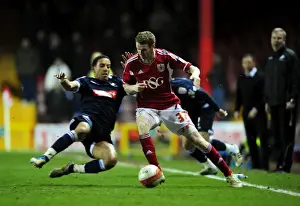 Bristol City V Millwall Prints: Stephen Pearson Dodges Tackle from Liam Trotter in Championship Match (Bristol City vs Millwall)