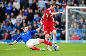 Images Dated 17th March 2012: Stephen Pearson Fouled by Scott Allan in Portsmouth vs. Bristol City Football Match, 2012