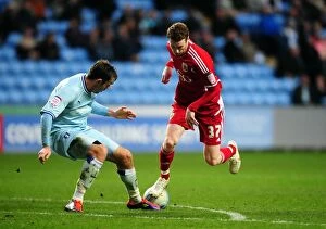 Images Dated 26th December 2011: Stephen Pearson vs. Richard Keogh: Intense Battle in Coventry City vs
