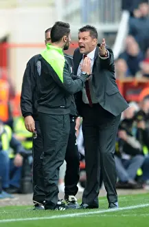 Steve Cotterill Argues with Fourth Official After Wade Elliott Red Card in Swindon Town vs
