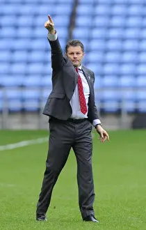 Framed Print : Steve Cotterill Salutes Coventry Fans: Triumphant Gesture at Ricoh Arena