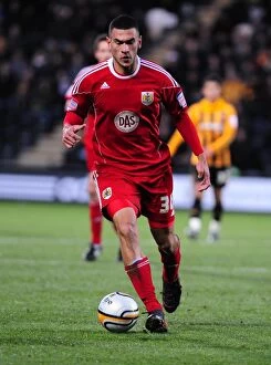 Images Dated 18th December 2010: Steven Caulker of Bristol City Faces Off in Championship Clash at Hull City's KC Stadium, 18/12/2010