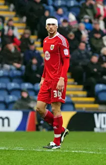 Preston V Bristol City Prints: Steven Caulker's Intense Face-off in Championship Clash at Deepdale Stadium (Preston vs)