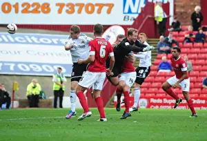 Framed Print : Steven Davies Close Call: A Heading Moment from Barnsley vs. Bristol City Championship Clash Framed Print : Steven Davies Close Call: A Heading Moment from Barnsley vs. Bristol City Championship Clash