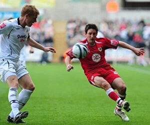 Images Dated 18th April 2009: Swansea vs. Bristol City: A Football Rivalry (08-09) - Clash of the Swans and Robins