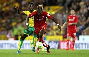 Images Dated 16th August 2016: Tammy Abraham Outmaneuvers Alexander Tettey: Norwich City vs. Bristol City Championship Clash, 2016