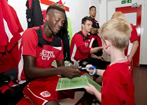 Bristol City V Wigan Athletic Prints: Tammy Abraham Signs Autograph for Mascot: Bristol City vs Wigan Athletic, 2016