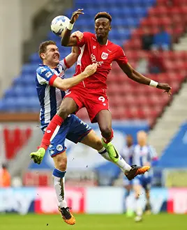 Wigan Athletic V Bristol City Prints: Tammy Abraham vs Jake Buxton: Intense Battle at DW Stadium - Wigan Athletic vs Bristol City