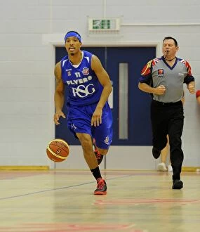 Bristol Flyers v Plymouth Raiders Collection: Thrilling Basketball Showdown: Flyers vs. Raiders at SGS Wise Campus (September 2014)