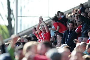 Images Dated 25th April 2015: Triumphant Bristol City Fans Celebrate at Chesterfield's Proact Stadium