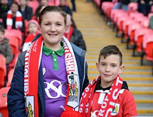 Triumphant Moment: Ecstatic Bristol City Fans Celebrate Johnstone's Paint Trophy Victory at Wembley Stadium