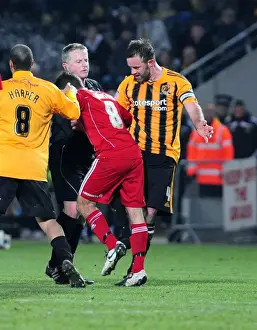 Framed Print : Unpunished Clash: Ashbee Kicks Out at Johnson in Hull City vs. Bristol City (18 / 12 / 2010)