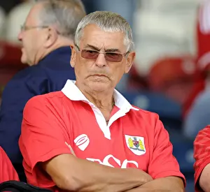 Rochdale V Bristol City Prints: Unwavering Support: A Bristol City Fan Amidst the Rivalry at Rochdale's Stadium (August 2014)