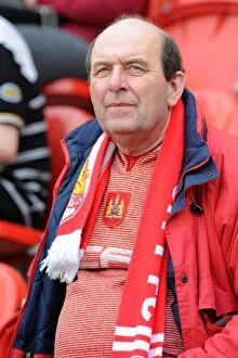 Images Dated 29th March 2014: Unwavering Support: A Bristol City Fan at Rotherham United vs