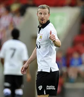 Wade Elliott in Action: Bristol City's Star Midfielder Shines in Pre-Season Friendly Against Cheltenham Town