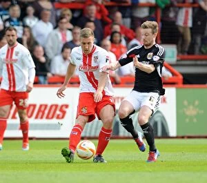 Images Dated 21st April 2014: Wade Elliott Closes In: Intense Moment from Stevenage vs. Bristol City, 2014