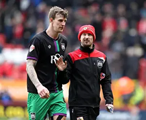 Wade Elliott Consults Aden Flint: Intense Moment at The Valley during Charlton Athletic vs. Bristol City (Sky Bet Championship)
