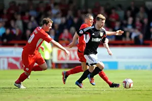 Wade Elliott Escape: Bristol City's Midfielder Evades Crawley Town Defender during Sky Bet League One Clash