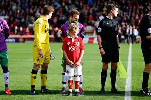 Wade Elliott and Mascot: Barnsley vs. Bristol City Football Match, October 2014