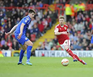 Wade Elliott Propels Ball Forward in Intense Bristol City vs Crewe Football Match