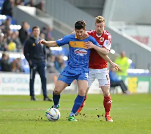 Wade Elliott vs Joe Jacobson: Intense Battle in Shrewsbury Town vs Bristol City Football Match, Sky Bet League One