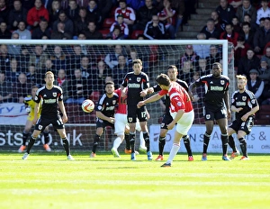 Wagstaff Blocks Taylor's Free Kick: Walsall vs. Bristol City, League One Rivalry