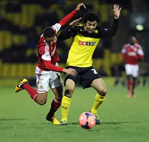Watford V Bristol City Replay Prints: Watford's Iriney Fouls Bobby Reid in FA Cup Third Round Replay: Watford v Bristol City (14/01/2014)