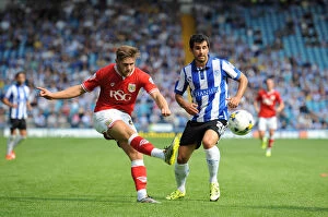 Images Dated 8th August 2015: Wes Burns Crosses Under Pressure: Sheffield Wednesday vs. Bristol City Championship Clash
