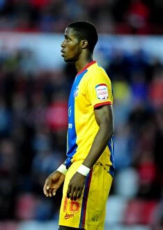 Images Dated 21st August 2012: Wilf Zaha's Determined Performance: Bristol City vs Crystal Palace, 2012