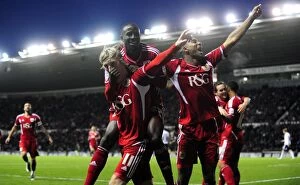 Images Dated 10th December 2011: Woolford and Adomah's Goal Celebration: Derby County vs. Bristol City (Championship Football)
