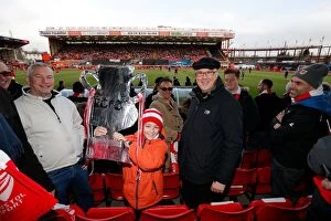 Fans Collection: Young Bristol City Fan with Cardboard FA Cup at Ashton Gate Stadium before Bristol City vs West