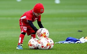 Images Dated 29th October 2016: Young Bristol City Fan Helps Out at Barnsley's Oakwell Stadium during Match