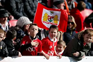 Bluebirds Prints: Young Bristol City Fan Shows Pride at Ashton Gate Stadium during Bristol City vs