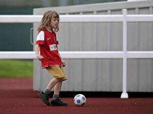 BAWFC v Arsenal Ladies Collection: Young Bristol City FC Fan's Excitement at FA WSL Match: BAWFC vs Arsenal Ladies