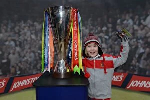 Images Dated 11th March 2015: Young Fan Celebrates with JPT Trophy at Cabot Circus