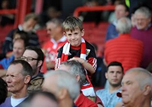 Images Dated 16th August 2014: Young Fan's Excitement at Bristol City vs Colchester United, Sky Bet League One Match at Ashton Gate