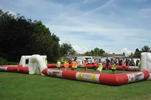 Portishead V Bristol City Prints: Young Fans Play Football on Inflatable Pitch Before Portishead Town vs. Bristol City Match