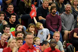Bristol Flyers V Plymouth Raiders BBL Cup Prints: Young Fan's Thrilling Basketball Experience: Bristol Flyers vs. Plymouth Raiders